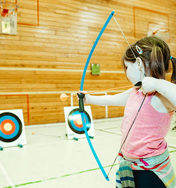 archery girl shooting arrow