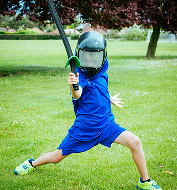 fencing boy wearing helmet