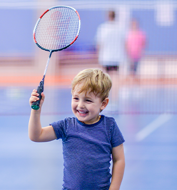 Badminton young boy racket 353x378 1