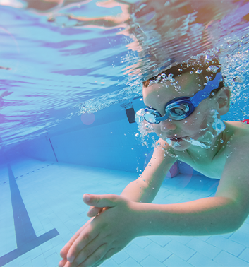 Swimming boy underwater 353x378 1