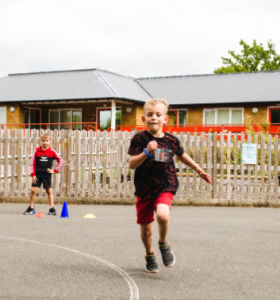 Child doing athletics at a Premier Education Holiday Camp
