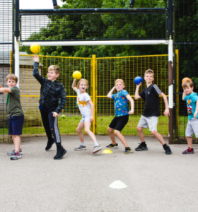 Children playing dodgeball at a Premier Education Holiday Camp 1
