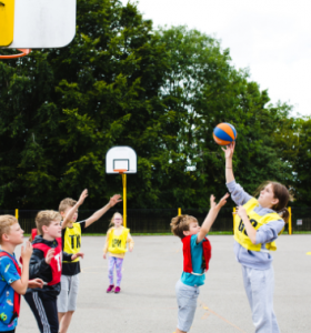Children playing netball at a Premier Education session