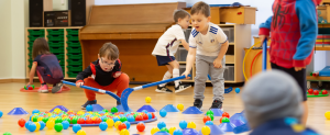 children enjoy winter games with premier edcuation