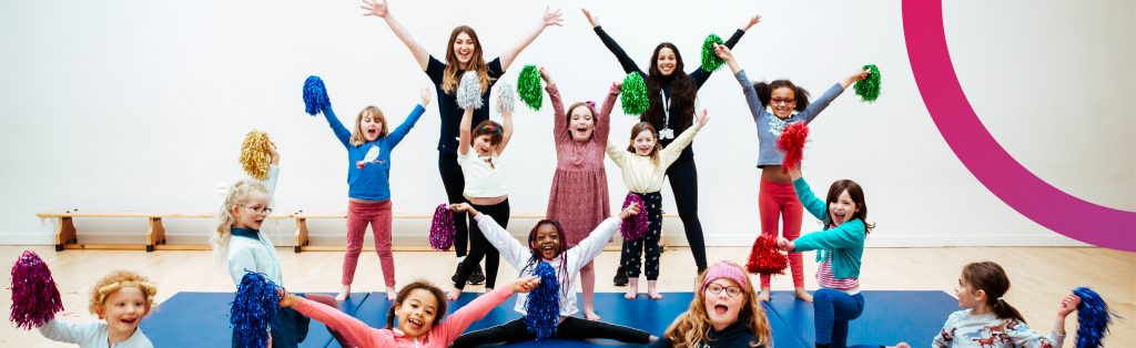 Children cheerleading at a Premier Education Holiday Camp
