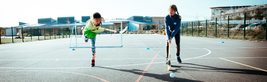 School sport: Children playing hockey