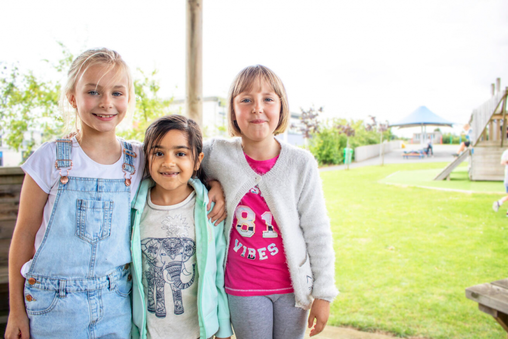 3 pupils smiling at a Premier Education Holiday Camp