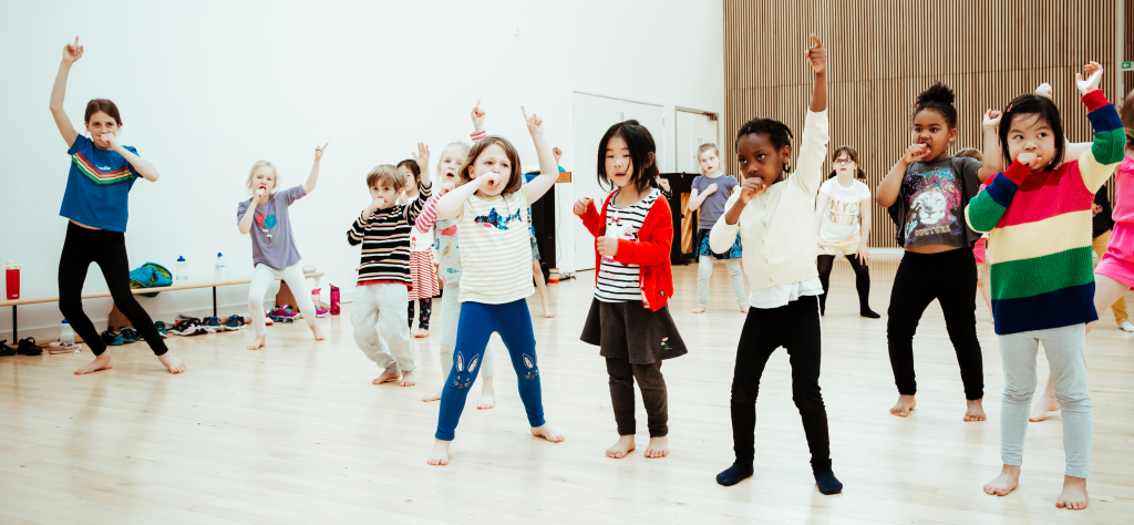 Children dancing during a Premier Education extracurricular club 