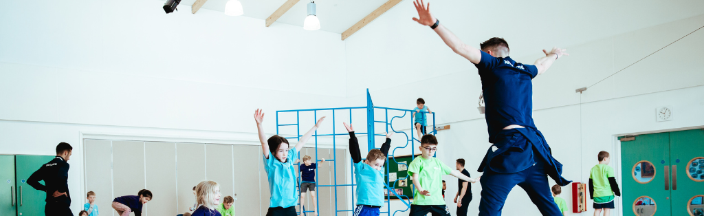 7 Spring Activities for Kids 3 Premier Education activity professional doing star jumps